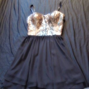 Black and gold party dress.